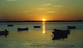 Sonnenuntergang mit Booten